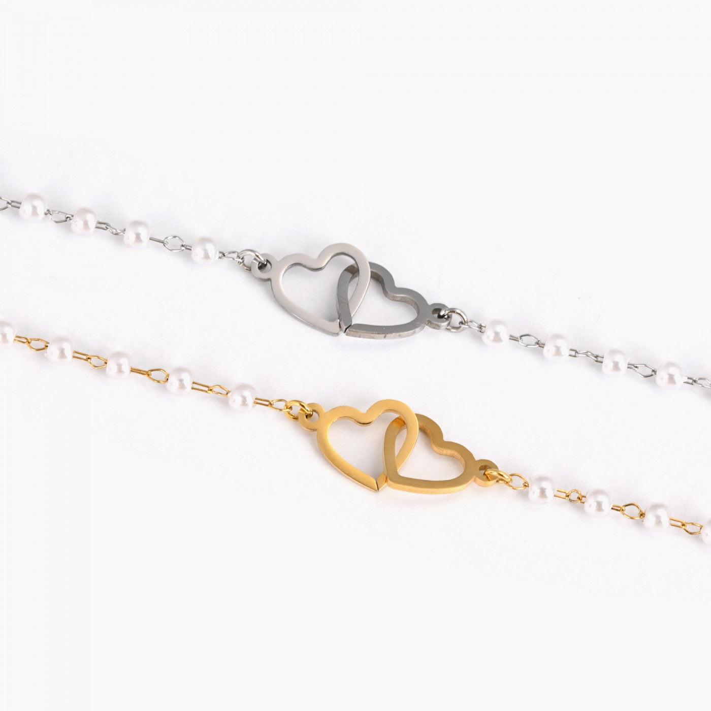 Pulseira em aço pérolas e corações