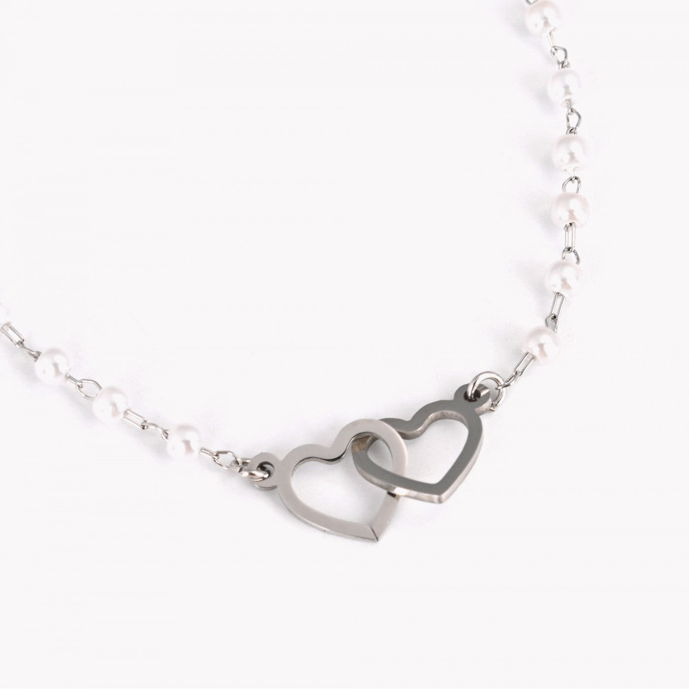 Pulseira em aço pérolas e corações