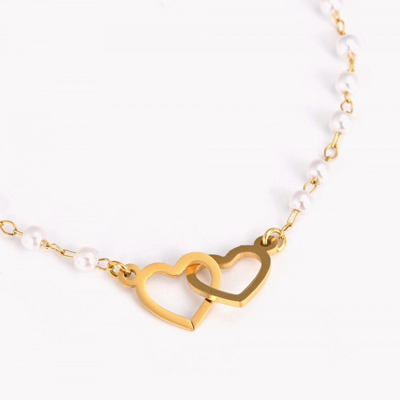 Pulseira em aço pérolas e corações
