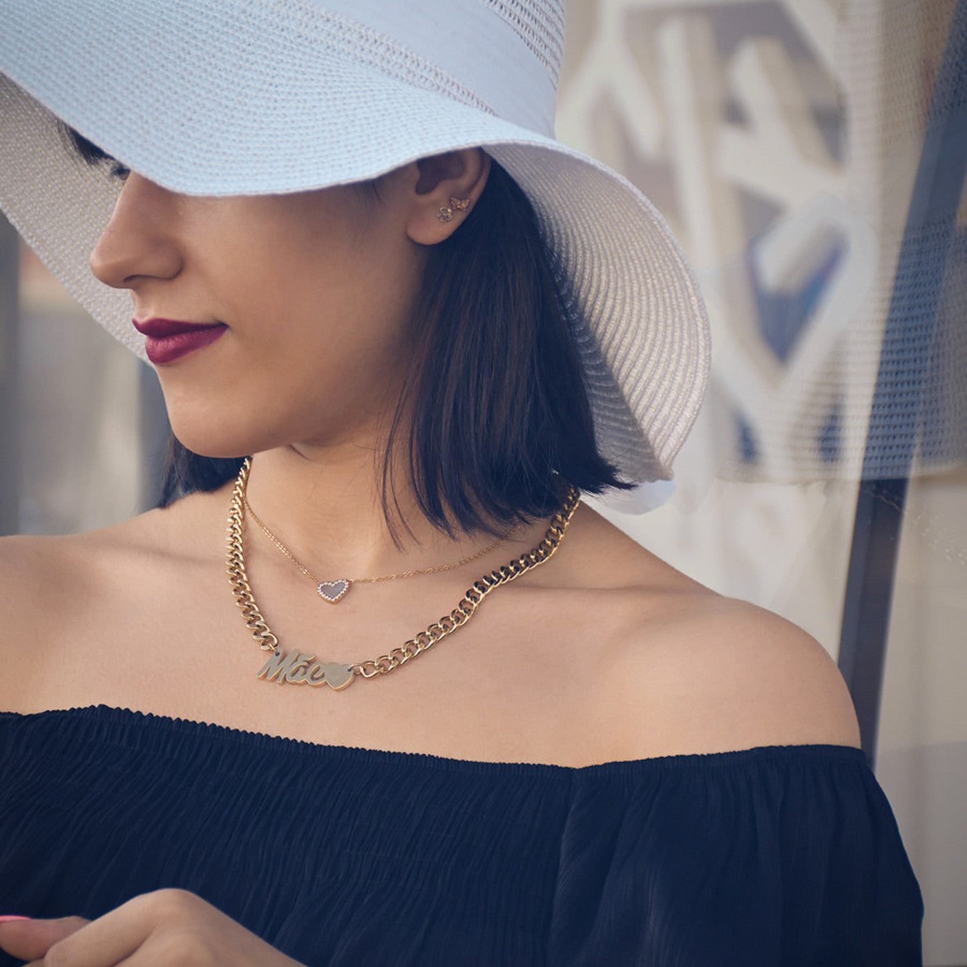 Collar de acero con la palabra MADRE