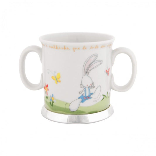 caneca coelhinho topázio da Topázio 1874 em porcelana branca com dois pegas e base prateada