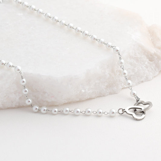 Collar de acero con corazones y lunares entrelazados 