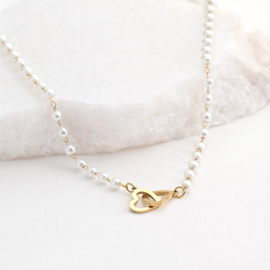 Collar de acero con corazones y lunares entrelazados 