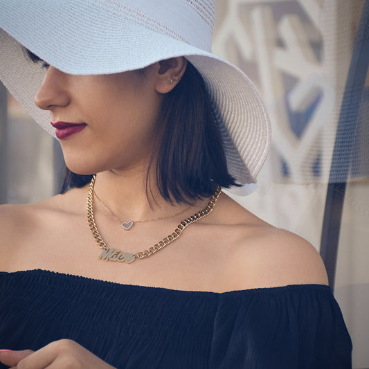 Collar de acero con la palabra MADRE