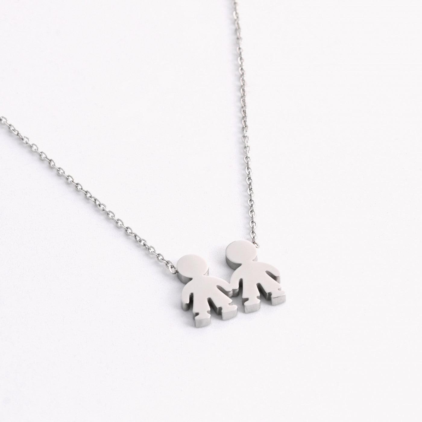 Collar de acero dos niños